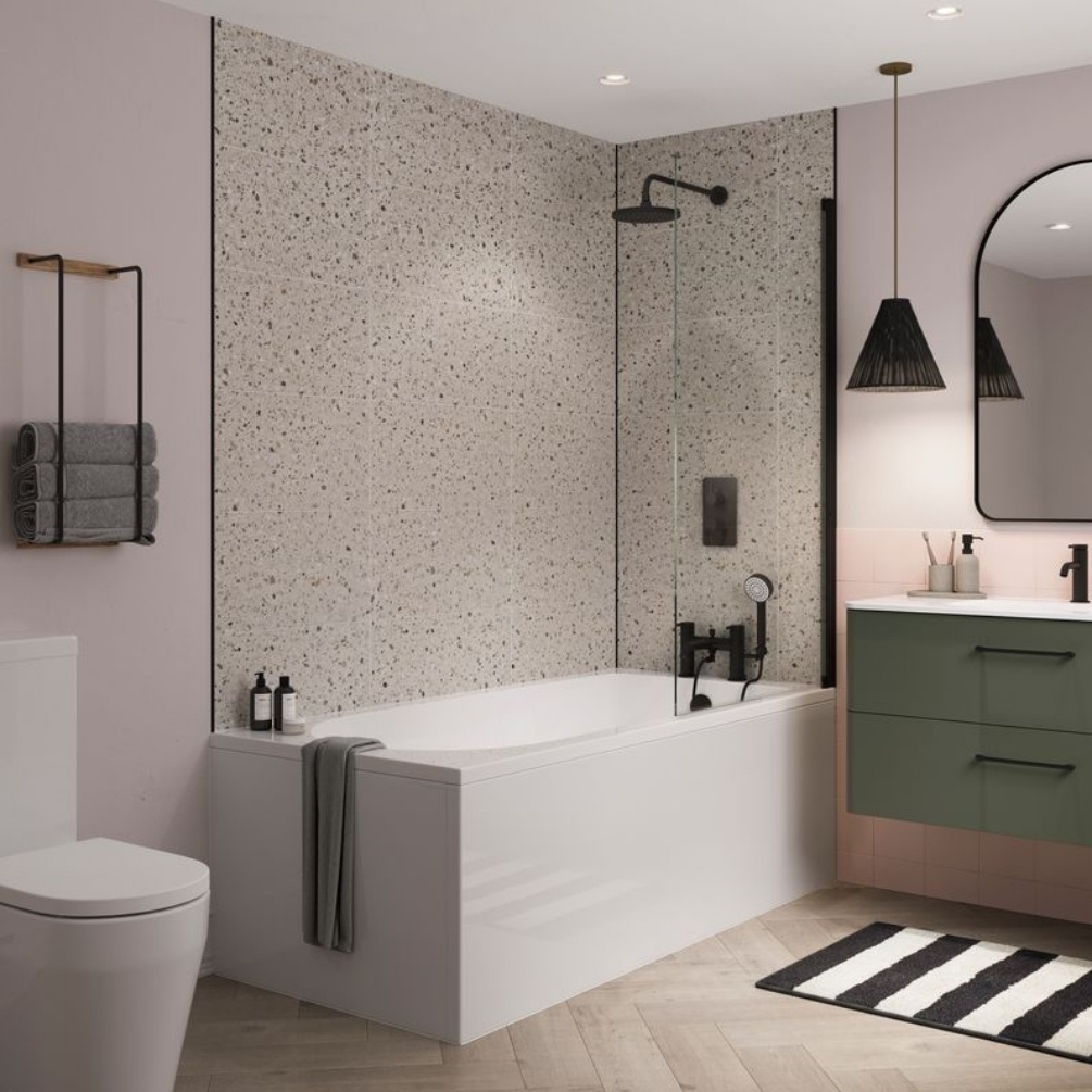 Lifestyle image of the Showerwall Laminate Cloud Terrazzo 2400mm x 600mm Rectangle Tile Effect Wall Panel - SWT13 installed behind a straight edged bathtub with black concealed shower and rainfall shower head